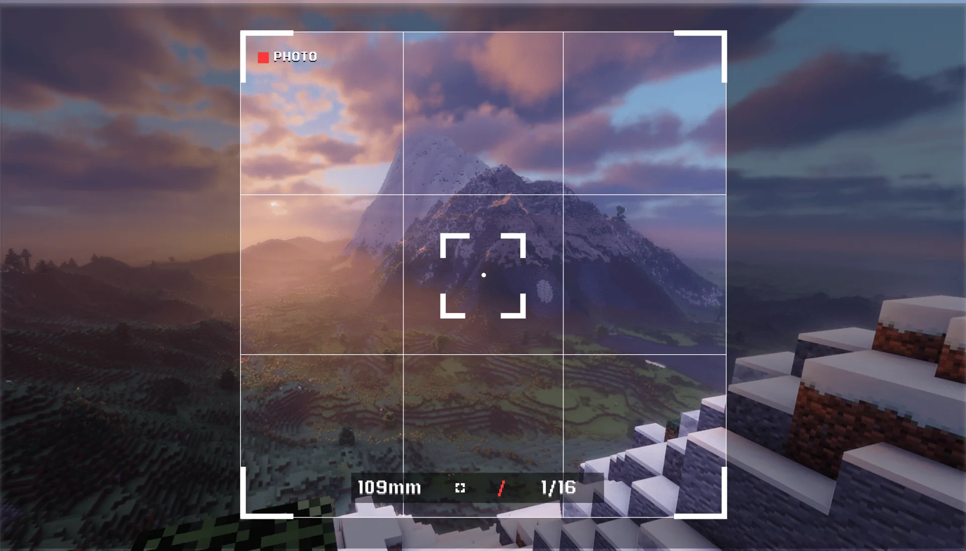 In-game Camera viewfinder framing a Minecraft mountain at sunset